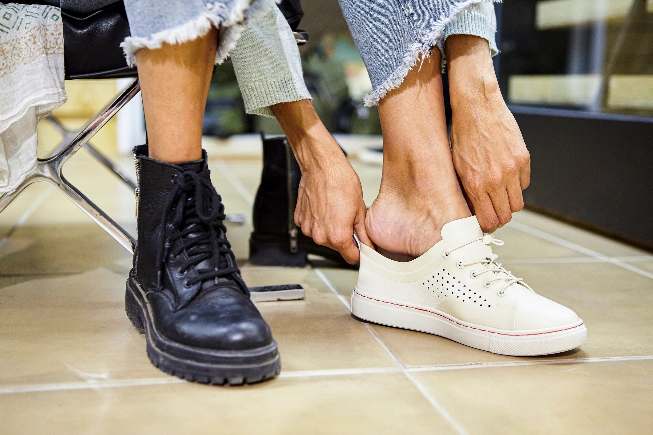 Close-up of footwear and insole fitting for pressure relief support